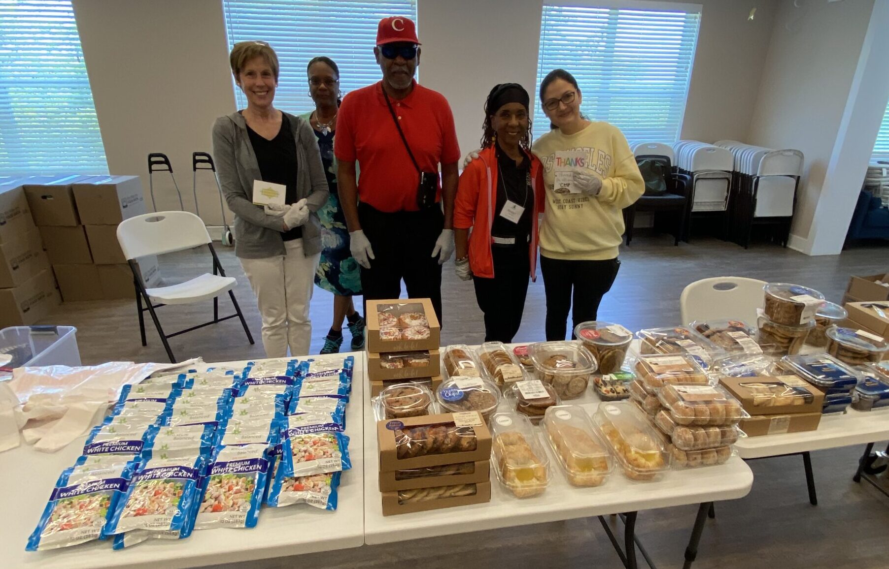 Group of people offering food donations