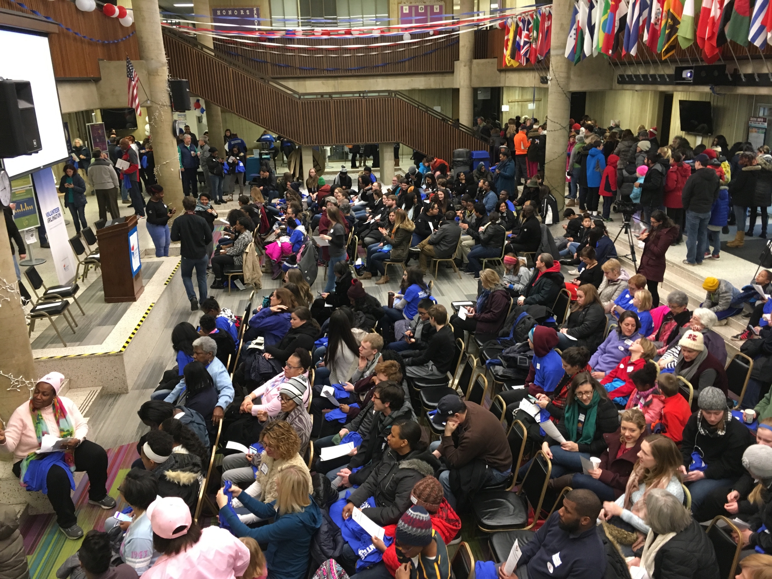 Large crowd gathered at an event focused on community engagement in Arlington