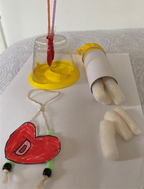 Three Rosie Riveter projects made by a seven-year-old resident.