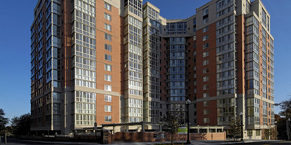 15-story building, brown and beige in color